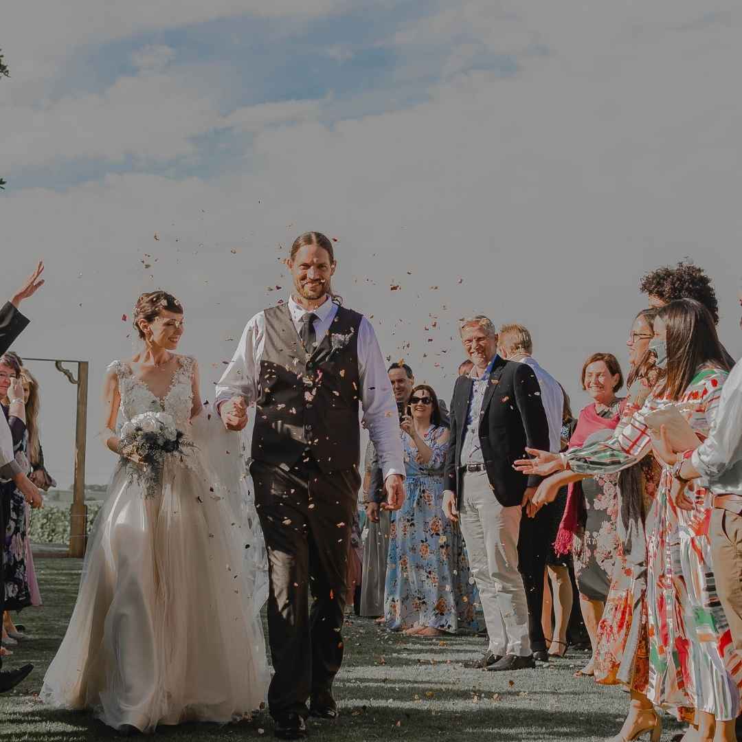 Image of Live wedding painting by Michelle Passey Studio showing two additional people with friends and family at the celebration.