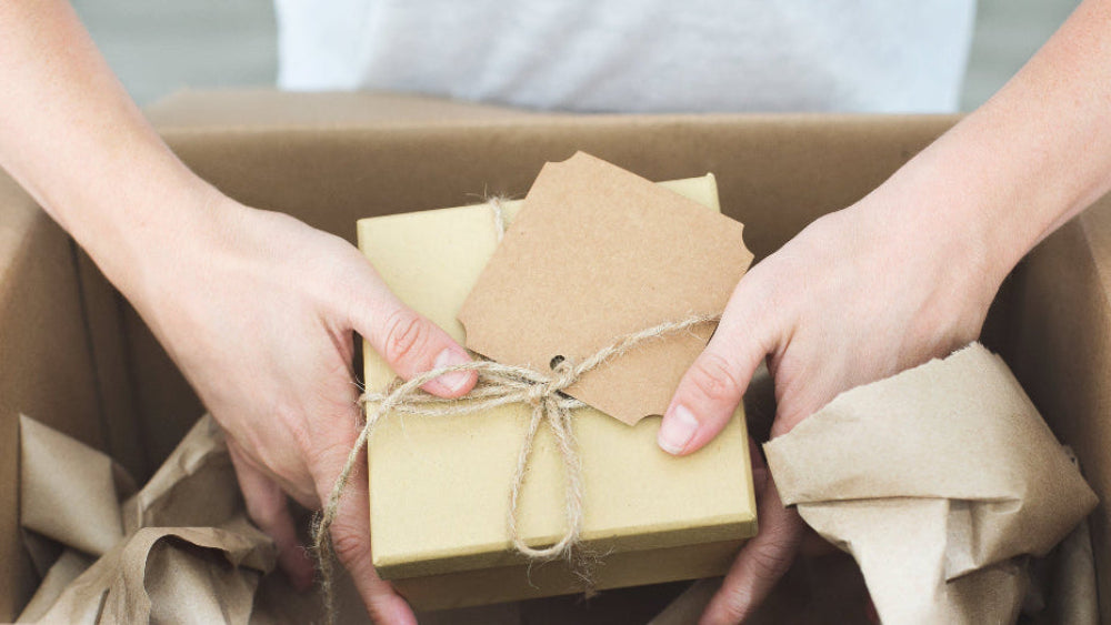 Image of Artist shipping a painting to their customer.